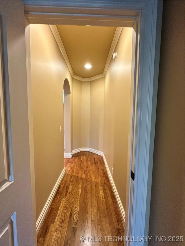 10213 S 88th E Ave, Tulsa, OK 74133 - hallway featuring ornamental molding, wood finished floors, and arched walkways