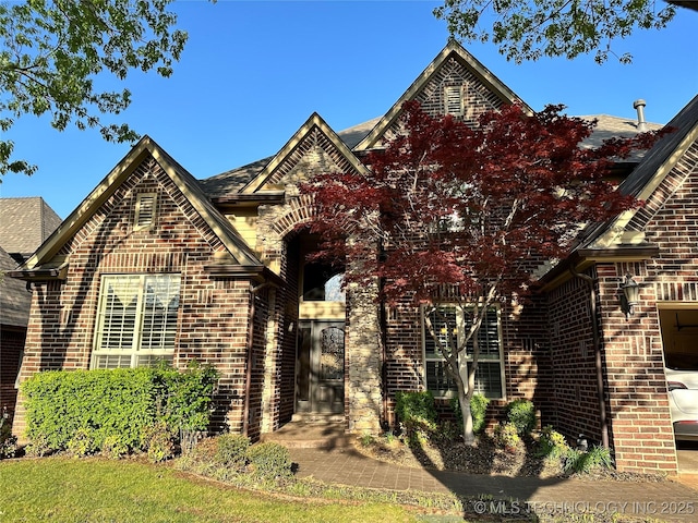 10213 S 88th E Ave, Tulsa, OK 74133 - view of front of house featuring brick siding