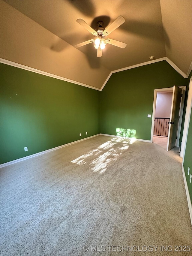 10213 S 88th E Ave, Tulsa, OK 74133 - spare room featuring a ceiling fan, lofted ceiling, and carpet