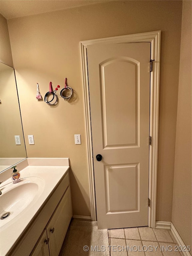 10213 S 88th E Ave, Tulsa, OK 74133 - bathroom with vanity and tile patterned floors