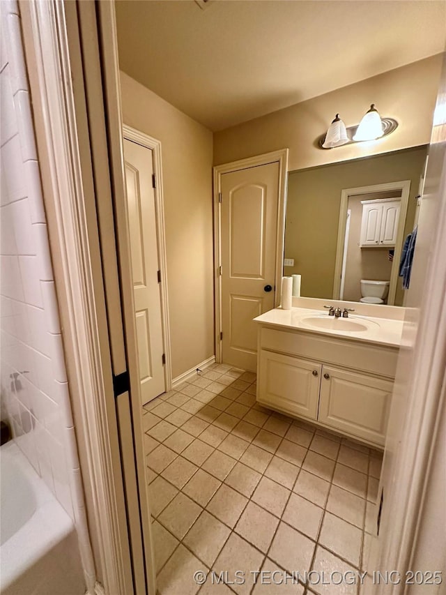 10213 S 88th E Ave, Tulsa, OK 74133 - full bath featuring tile patterned floors, vanity, and tub / shower combination