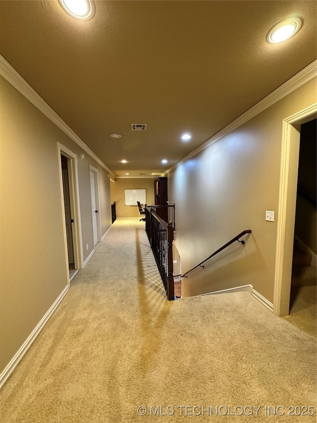 10213 S 88th E Ave, Tulsa, OK 74133 - corridor featuring an upstairs landing, carpet flooring, crown molding, and recessed lighting