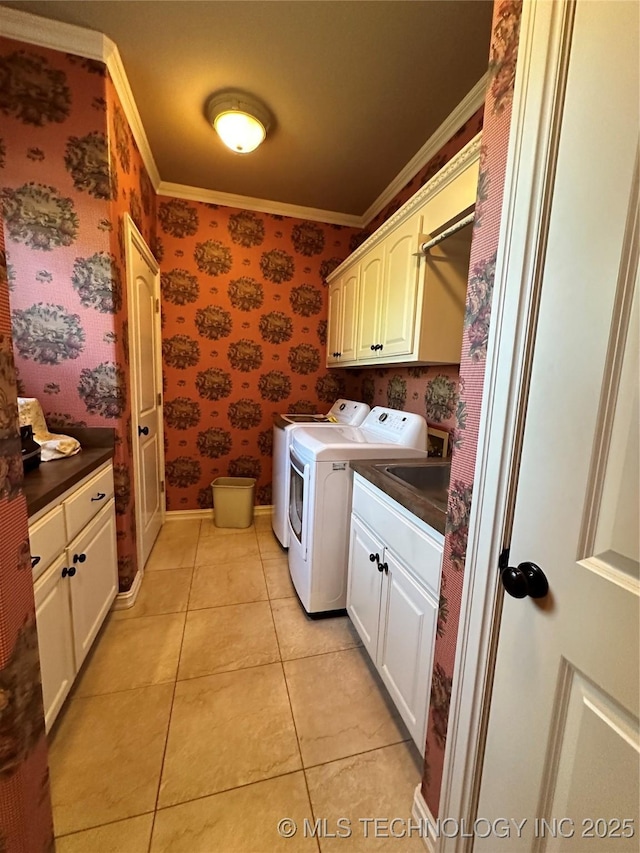 10213 S 88th E Ave, Tulsa, OK 74133 - laundry area featuring cabinet space, crown molding, washing machine and clothes dryer, wallpapered walls, and light tile patterned floors