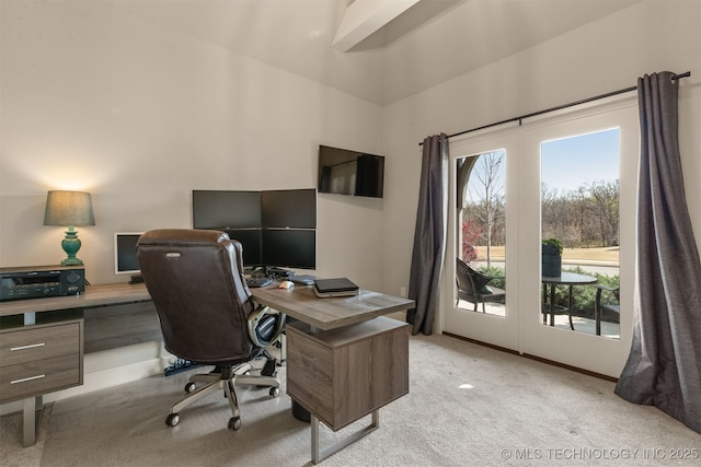 home office featuring light colored carpet