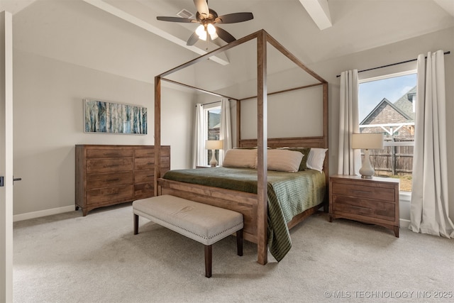 bedroom featuring lofted ceiling, light colored carpet, a ceiling fan, and baseboards