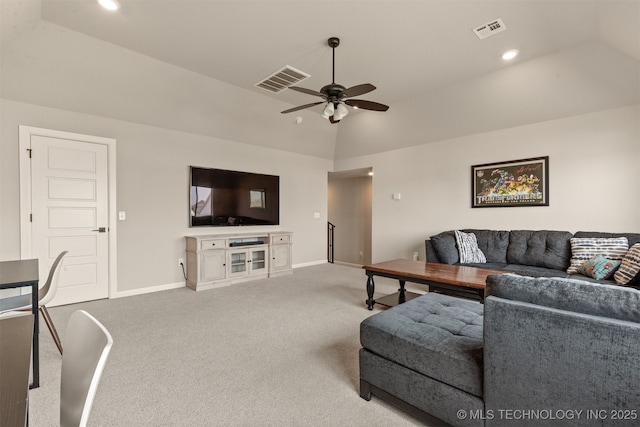 carpeted living room with visible vents, ceiling fan, vaulted ceiling, and baseboards