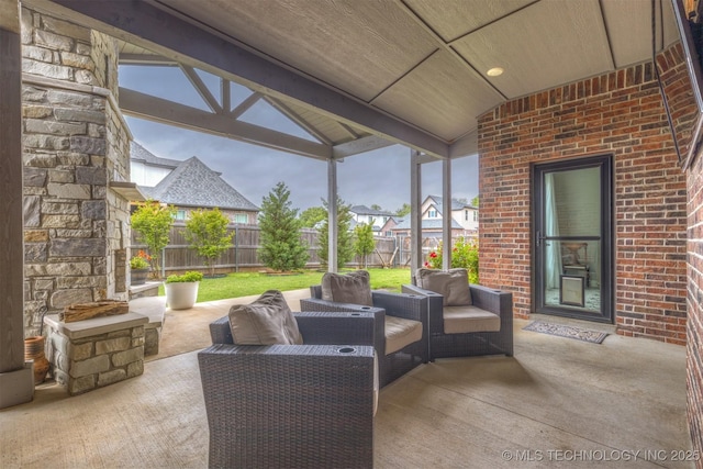 view of patio with outdoor lounge area and a fenced backyard