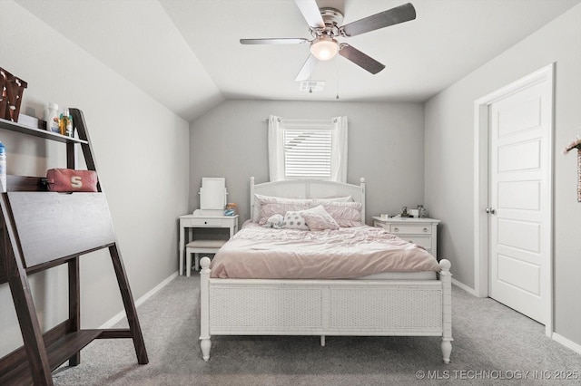 bedroom with vaulted ceiling, ceiling fan, baseboards, carpet flooring, and visible vents