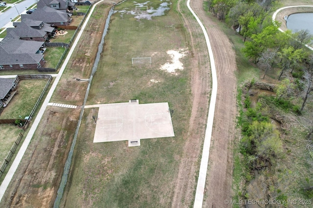 aerial view with a residential view and a water view