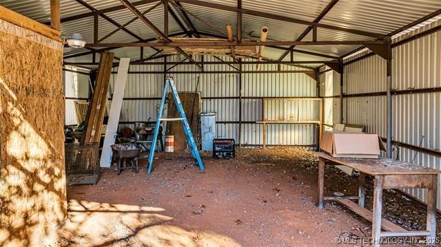 13760 SW Wilderness, Kingston, OK 73439 - garage with metal wall