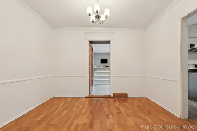 204 S Jamestown Ave, Tulsa, OK 74112 - unfurnished dining area featuring wood finished floors, a chandelier, baseboards, and ornamental molding