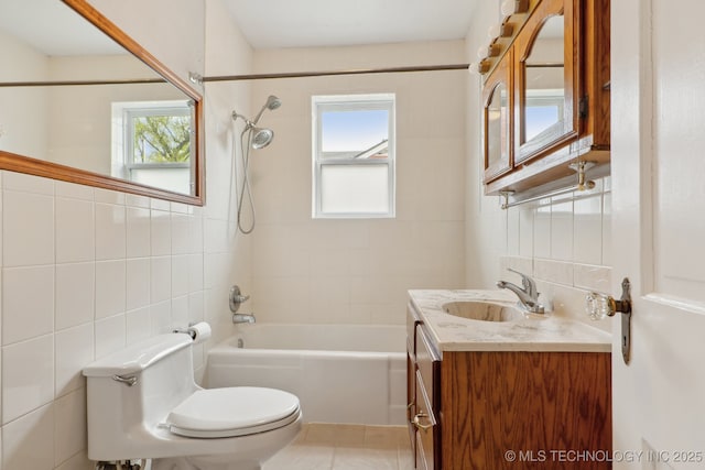 204 S Jamestown Ave, Tulsa, OK 74112 - bathroom with tile walls, toilet, shower / washtub combination, vanity, and healthy amount of natural light