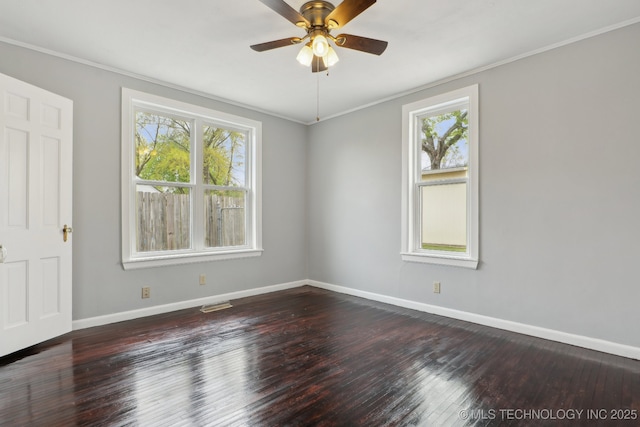 204 S Jamestown Ave, Tulsa, OK 74112 - spare room with plenty of natural light, baseboards, ornamental molding, and hardwood / wood-style floors