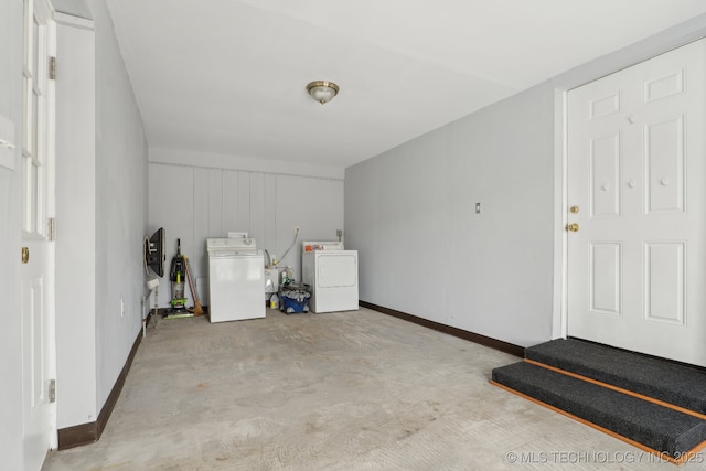 204 S Jamestown Ave, Tulsa, OK 74112 - garage featuring separate washer and dryer and baseboards