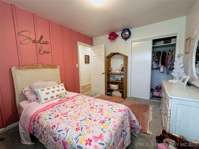 bedroom featuring a closet and carpet floors