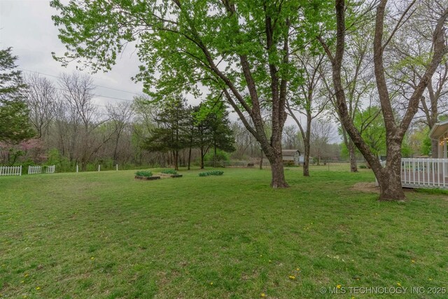 view of yard with fence