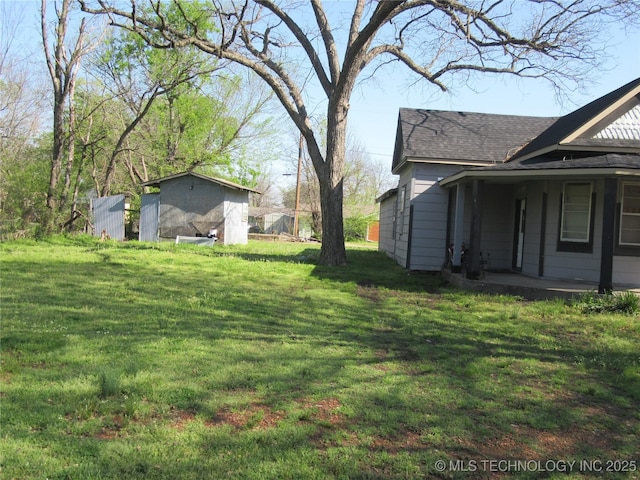 123 E Morris, Mcalester, OK 74501 - view of yard with an outbuilding