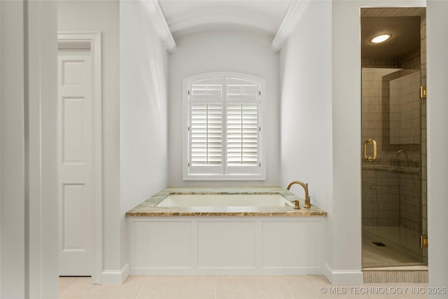 5815 S Knoxville Ave, Tulsa, OK 74135 - bathroom with a stall shower, a garden tub, baseboards, and tile patterned flooring