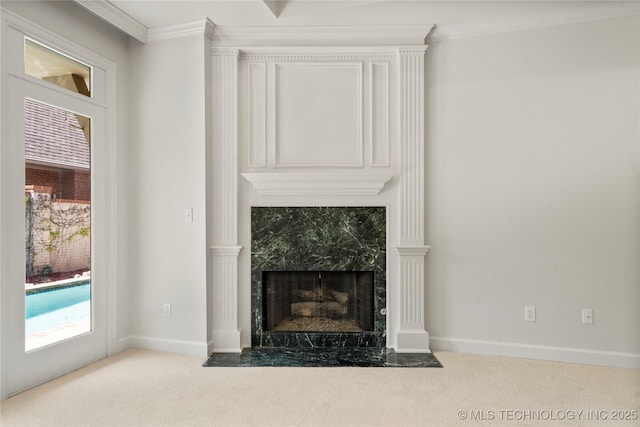 5815 S Knoxville Ave, Tulsa, OK 74135 - unfurnished living room featuring ornamental molding, carpet floors, and a fireplace
