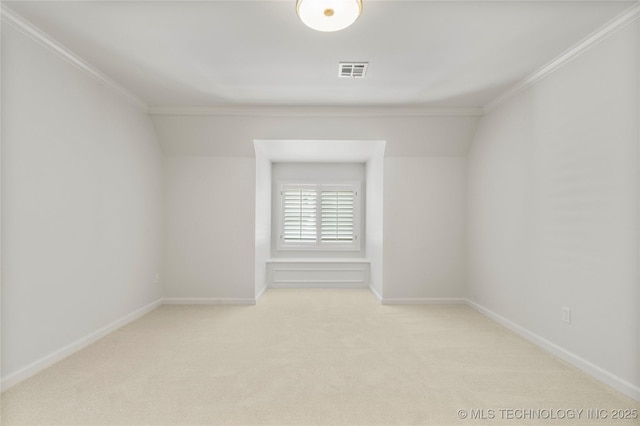 5815 S Knoxville Ave, Tulsa, OK 74135 - spare room featuring carpet flooring, visible vents, baseboards, and ornamental molding