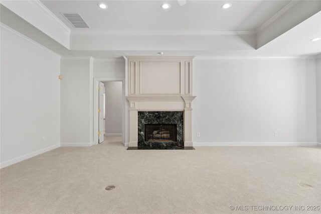 5815 S Knoxville Ave, Tulsa, OK 74135 - unfurnished living room featuring ornamental molding, visible vents, a tray ceiling, and a fireplace