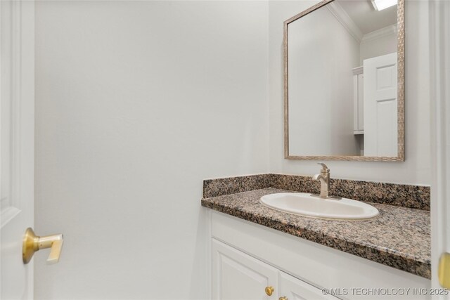 5815 S Knoxville Ave, Tulsa, OK 74135 - bathroom with vanity and crown molding