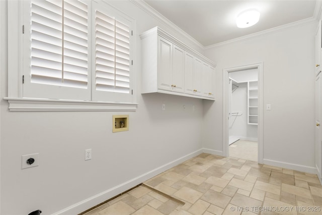 5815 S Knoxville Ave, Tulsa, OK 74135 - laundry room with hookup for an electric dryer, baseboards, crown molding, washer hookup, and cabinet space
