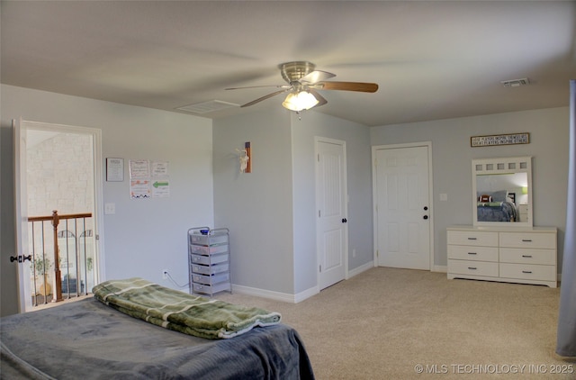 bedroom with visible vents, a ceiling fan, carpet flooring, and baseboards