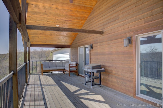 deck with an outdoor hangout area