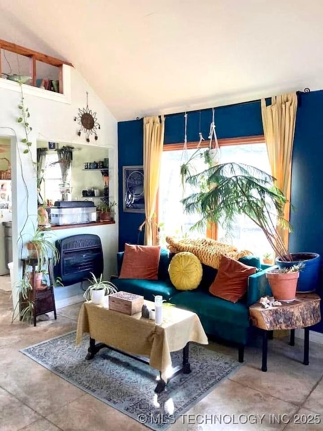 405 N Industrial Ave, Sand Springs, OK 74063 - living room featuring concrete flooring and vaulted ceiling