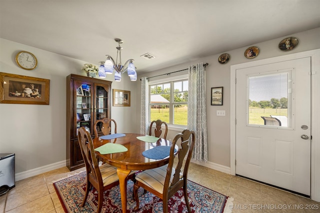 2003 Estates, Grove, OK 74344 - dining area with visible vents, light tile patterned floors, a notable chandelier, and baseboards