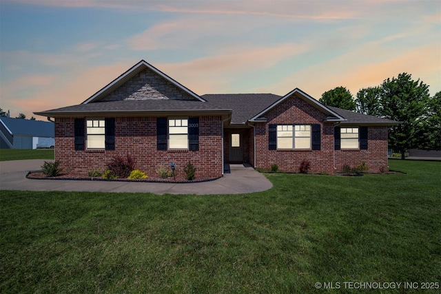 2003 Estates, Grove, OK 74344 - ranch-style house featuring brick siding, a front lawn, and a shingled roof