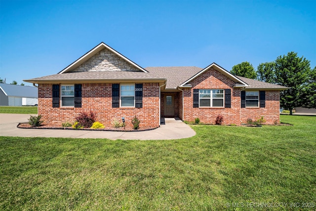2003 Estates, Grove, OK 74344 - ranch-style house featuring brick siding, a front yard, and roof with shingles