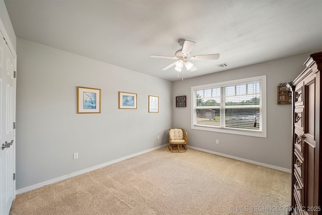 2003 Estates, Grove, OK 74344 - spare room featuring carpet, visible vents, baseboards, and ceiling fan