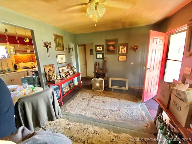 603 E Chickasaw St, Marietta, OK 73448 - living area with a ceiling fan and plenty of natural light