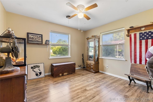 221 S Harvey, Ada, OK 74820 - sitting room with light wood-style flooring and a ceiling fan
