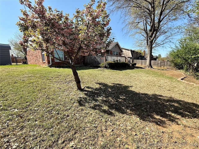 view of yard with fence