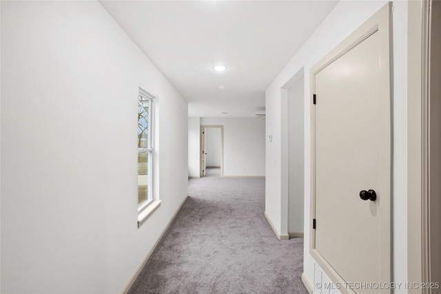 2002 W Driftwood Dr, Claremore, OK 74017 - hallway with baseboards and carpet