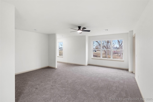 2002 W Driftwood Dr, Claremore, OK 74017 - carpeted spare room with visible vents, baseboards, and ceiling fan