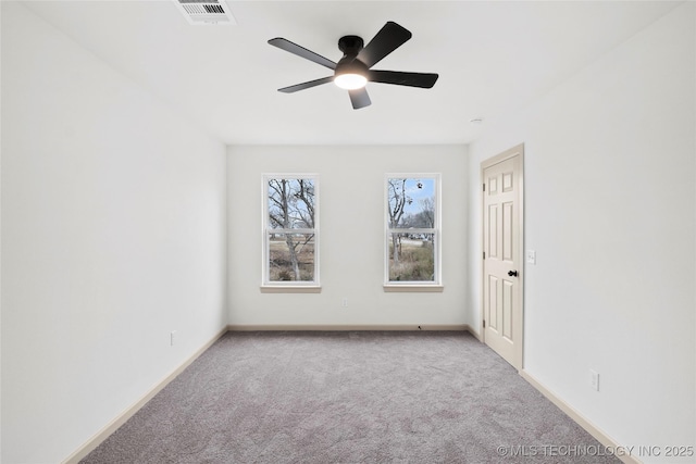 2002 W Driftwood Dr, Claremore, OK 74017 - carpeted empty room with visible vents, baseboards, and ceiling fan