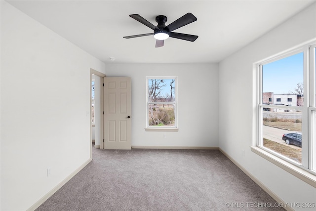 2002 W Driftwood Dr, Claremore, OK 74017 - empty room with carpet flooring, baseboards, and a ceiling fan