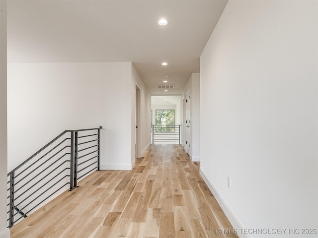 12415 Lakeview Rd, Sperry, OK 74073 - hallway featuring visible vents, baseboards, light wood-type flooring, an upstairs landing, and recessed lighting