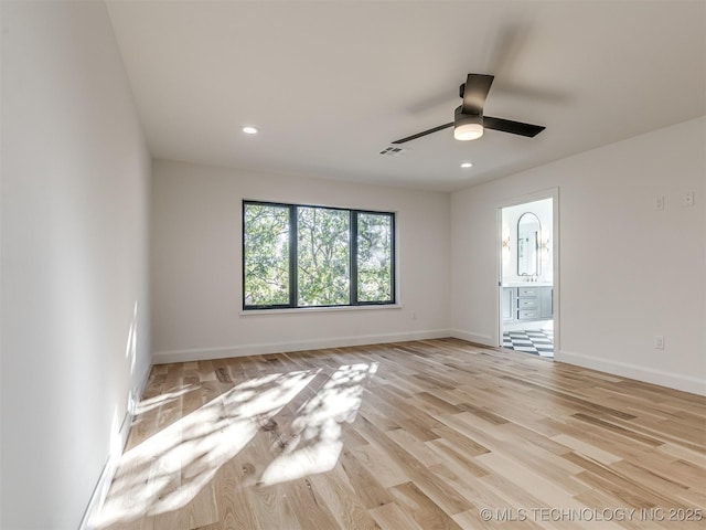 12415 Lakeview Rd, Sperry, OK 74073 - spare room featuring recessed lighting, light wood-type flooring, baseboards, and ceiling fan