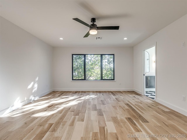 12415 Lakeview Rd, Sperry, OK 74073 - unfurnished room with visible vents, baseboards, a ceiling fan, and light wood-style flooring