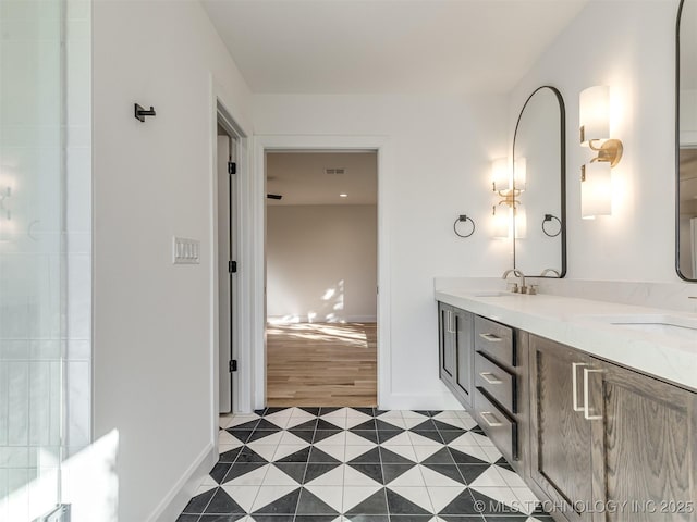 12415 Lakeview Rd, Sperry, OK 74073 - bathroom featuring a sink, visible vents, tile patterned floors, and double vanity