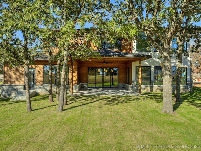 12415 Lakeview Rd, Sperry, OK 74073 - rear view of property with a patio area, a ceiling fan, and a lawn