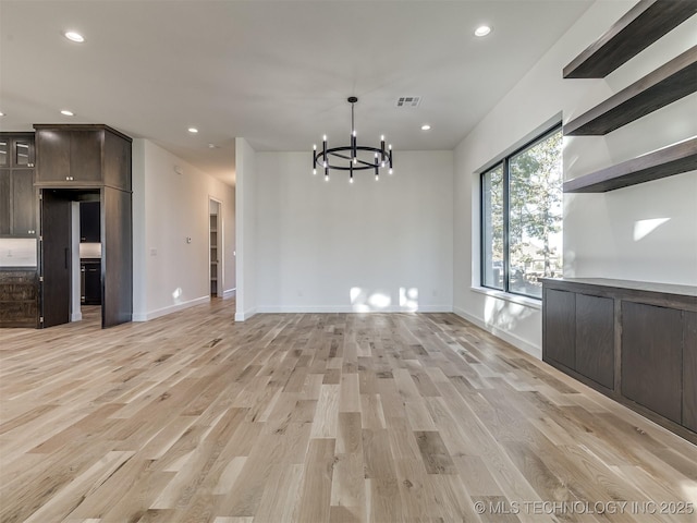 12415 Lakeview Rd, Sperry, OK 74073 - unfurnished dining area featuring visible vents, light wood-style flooring, recessed lighting, and a notable chandelier