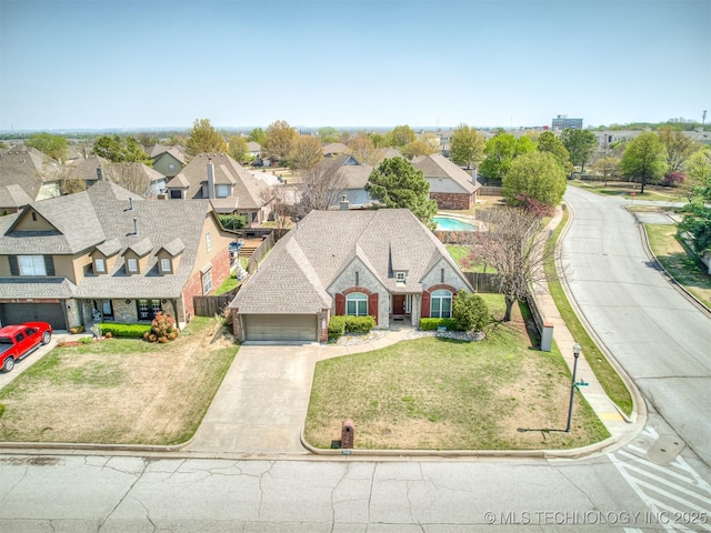 drone / aerial view with a residential view