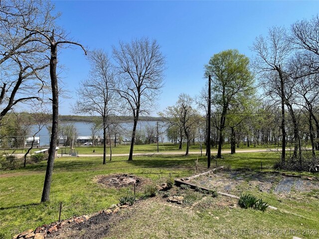 72036 S 324th Rd, Wagoner, OK 74467 - view of green lawn featuring a water view