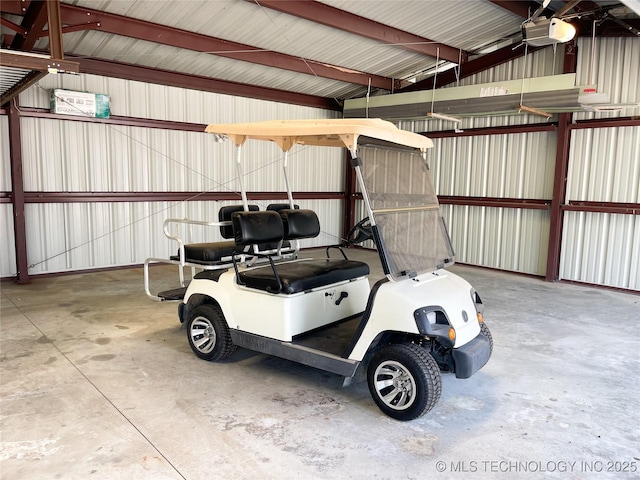 72036 S 324th Rd, Wagoner, OK 74467 - garage with a garage door opener and metal wall